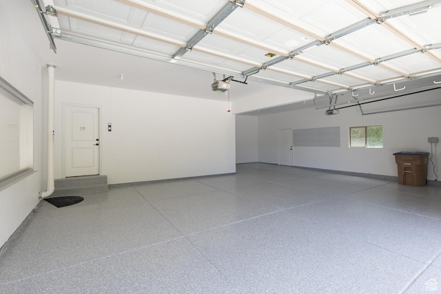 14825 S Meadow Oak Ct, Draper, UT 84020 - garage featuring a garage door opener and baseboards