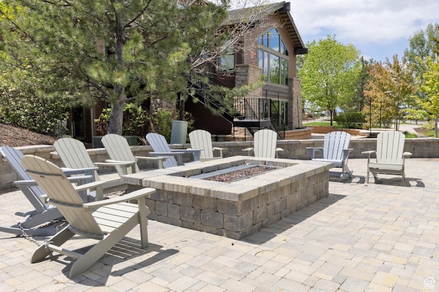 14825 S Meadow Oak Ct, Draper, UT 84020 - view of patio / terrace featuring an outdoor fire pit and stairs