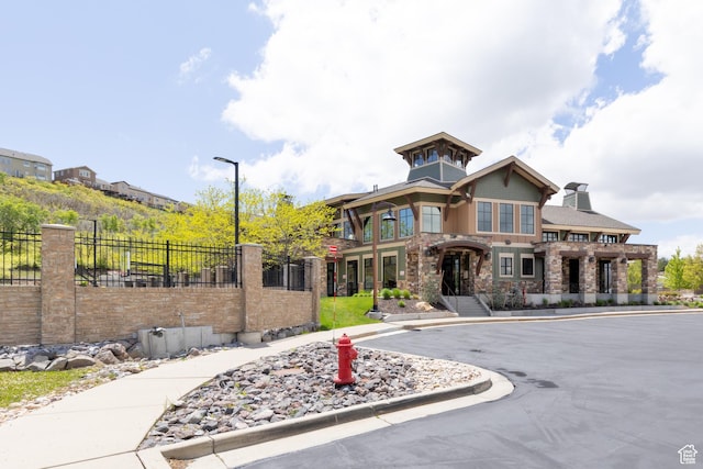 14825 S Meadow Oak Ct, Draper, UT 84020 - view of front of house featuring stone siding and a chimney