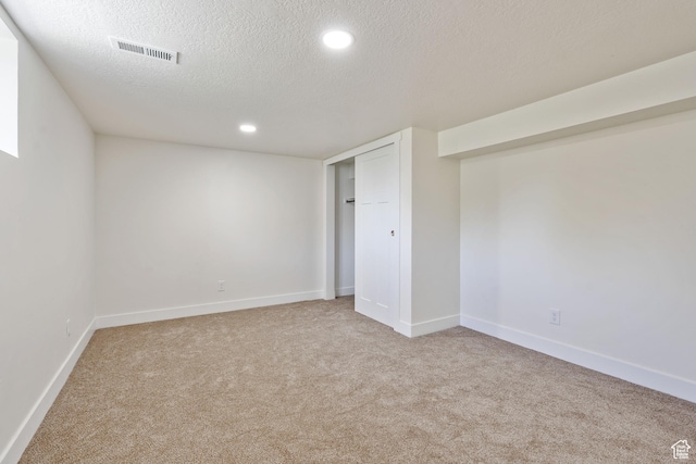 905 N 100 E, Pleasant Grove, UT 84062 - basement featuring carpet floors, a textured ceiling, baseboards, and recessed lighting