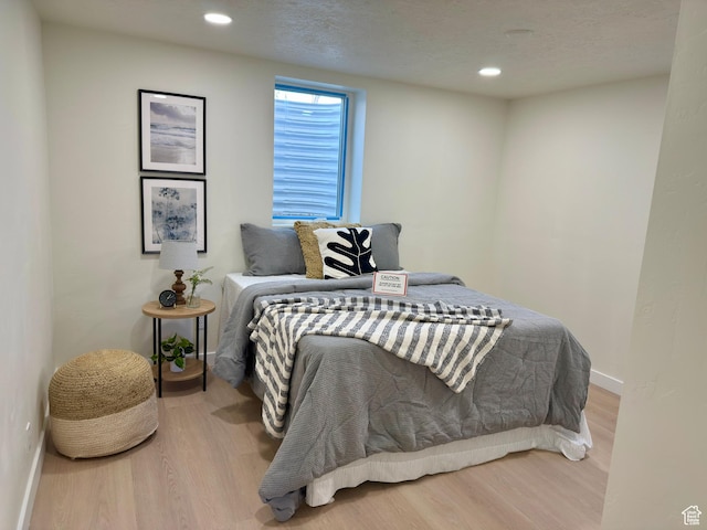 5011 S Leisure Ln W, Taylorsville, UT 84129 - bedroom featuring wood finished floors, baseboards, and recessed lighting