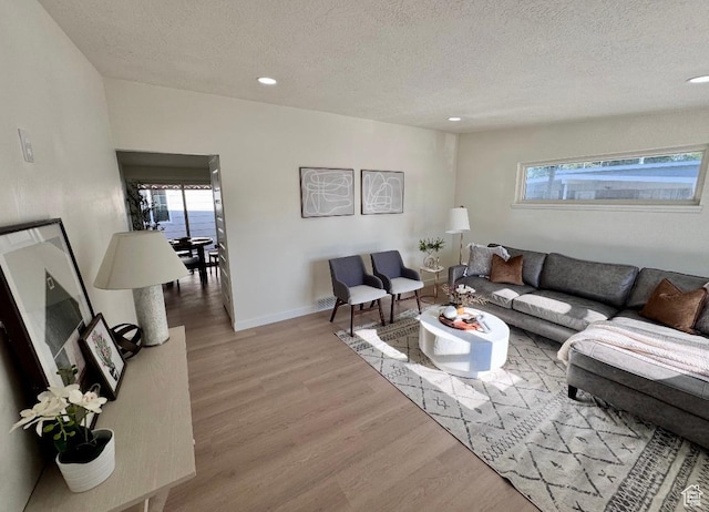 5011 S Leisure Ln W, Taylorsville, UT 84129 - living room with a textured ceiling, wood finished floors, recessed lighting, and baseboards