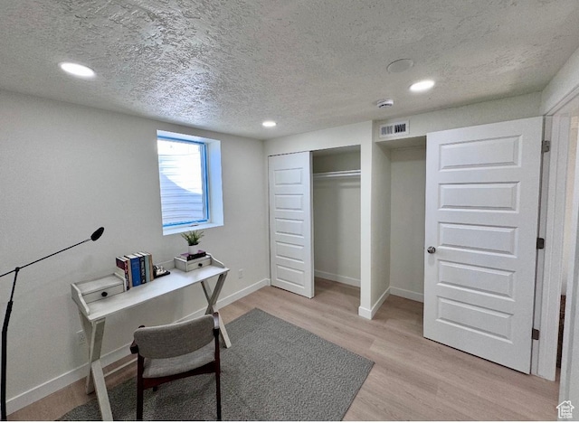 5011 S Leisure Ln W, Taylorsville, UT 84129 - office space featuring a textured ceiling, light wood-type flooring, recessed lighting, and baseboards