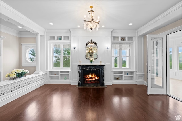 3291 E 1300 N, Layton, UT 84040 - unfurnished living room with decorative columns, wood finished floors, a lit fireplace, crown molding, and recessed lighting