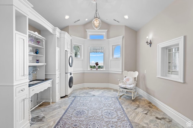 3291 E 1300 N, Layton, UT 84040 - laundry room with stacked washer and clothes dryer, light marble finish flooring, baseboards, and recessed lighting