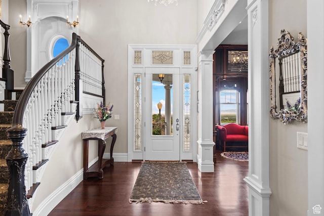 3291 E 1300 N, Layton, UT 84040 - entrance foyer featuring wood finished floors, a high ceiling, stairway, and baseboards