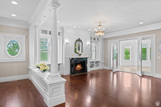 3291 E 1300 N, Layton, UT 84040 - unfurnished living room featuring ornate columns, dark wood-style flooring, baseboards, ornamental molding, and recessed lighting