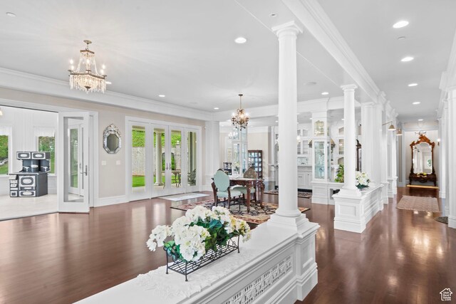 3291 E 1300 N, Layton, UT 84040 - living area featuring a chandelier, dark wood finished floors, french doors, ornamental molding, and ornate columns