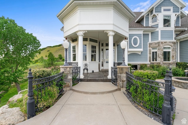 3291 E 1300 N, Layton, UT 84040 - view of front facade with covered porch, stone siding, and a shingled roof