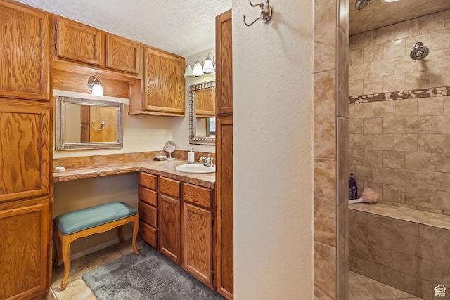 154 E 950 N, Glenwood, UT 84730 - full bathroom with a stall shower, vanity, tile patterned floors, and a textured ceiling
