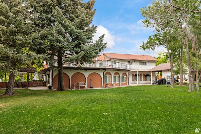 154 E 950 N, Glenwood, UT 84730 - rear view of property with a balcony, a lawn, and a pergola