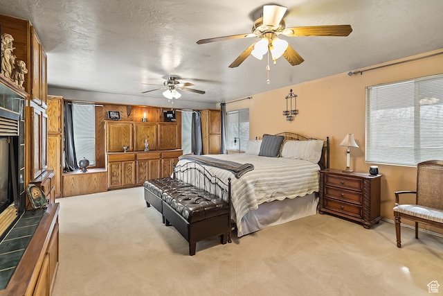 154 E 950 N, Glenwood, UT 84730 - bedroom featuring light colored carpet and ceiling fan