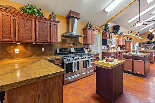 154 E 950 N, Glenwood, UT 84730 - kitchen with a center island with sink, appliances with stainless steel finishes, extractor fan, ceiling fan, and backsplash
