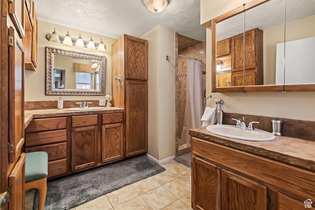 154 E 950 N, Glenwood, UT 84730 - bathroom with curtained shower, a textured ceiling, tile patterned flooring, and two vanities