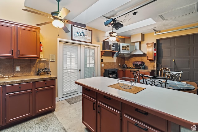 154 E 950 N, Glenwood, UT 84730 - kitchen featuring ceiling fan, wall chimney exhaust hood, backsplash, and open shelves