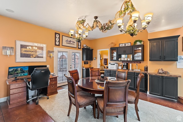 154 E 950 N, Glenwood, UT 84730 - dining area featuring a chandelier, french doors, a desk, and finished concrete floors