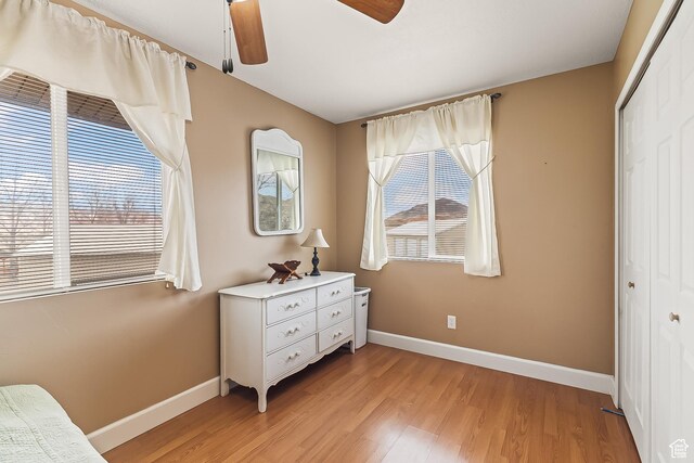 154 E 950 N, Glenwood, UT 84730 - bedroom with baseboards, a closet, light wood finished floors, and a ceiling fan