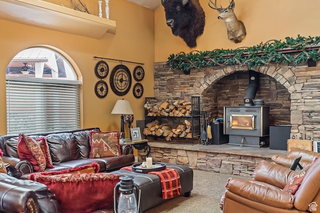 154 E 950 N, Glenwood, UT 84730 - carpeted living area featuring a wood stove