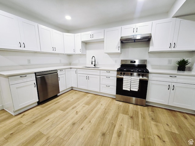 4505 W 5335 S, Kearns, UT 84118 - kitchen with stainless steel appliances, under cabinet range hood, a sink, light countertops, and recessed lighting