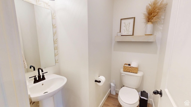 9367 N Vernham Way E, Eagle Mountain, UT 84005 - bathroom with a sink, toilet, and baseboards