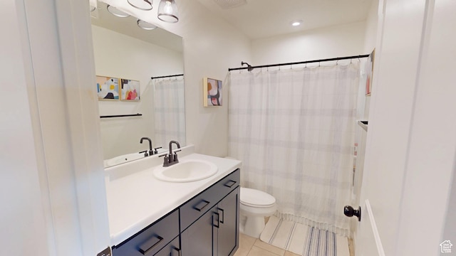 9367 N Vernham Way E, Eagle Mountain, UT 84005 - bathroom featuring vanity, tile patterned flooring, toilet, and a shower with shower curtain