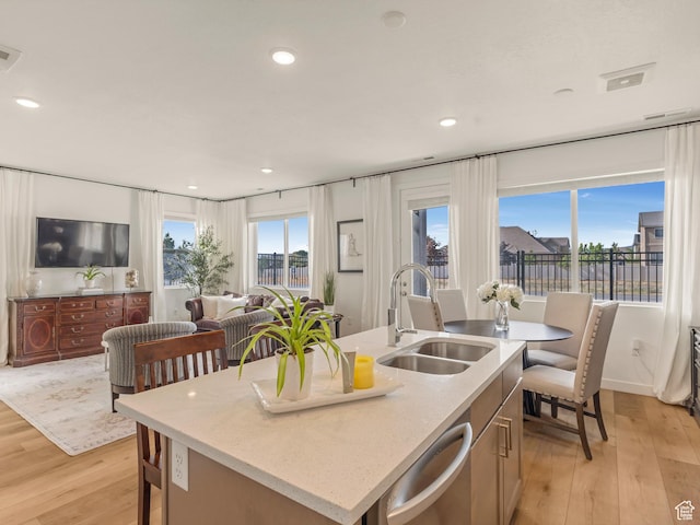 1512 W Fiore St, Farmington, UT 84025 - kitchen featuring a sink, dishwasher, light wood-style flooring, recessed lighting, and open floor plan