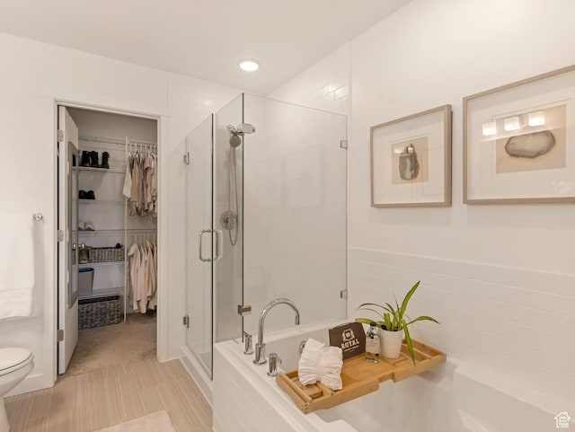 1512 W Fiore St, Farmington, UT 84025 - full bath with a stall shower, a bath, a walk in closet, toilet, and recessed lighting