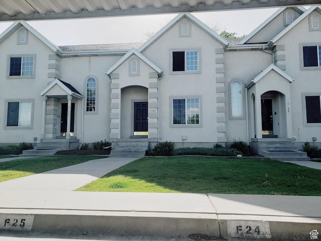 4142 S Davencrest Ln, Taylorsville, UT 84129 - view of front of home featuring a front yard and stucco siding