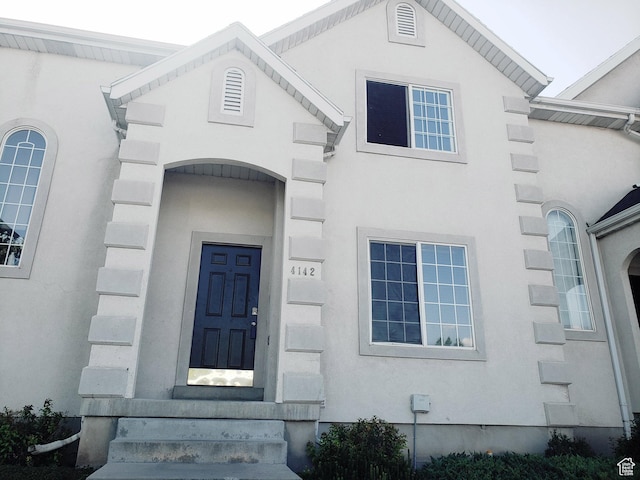 4142 S Davencrest Ln, Taylorsville, UT 84129 - view of exterior entry featuring stucco siding