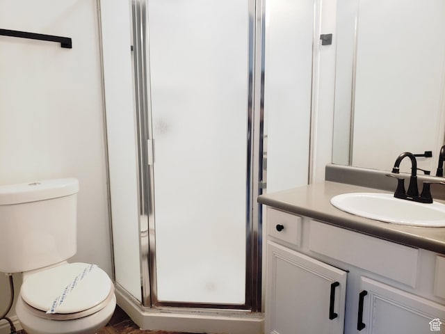 4142 S Davencrest Ln, Taylorsville, UT 84129 - bathroom featuring toilet, a stall shower, and vanity