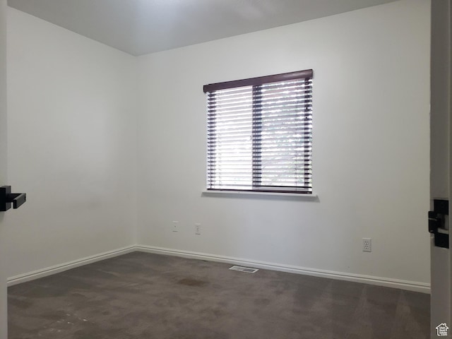 4142 S Davencrest Ln, Taylorsville, UT 84129 - unfurnished room with baseboards and dark carpet
