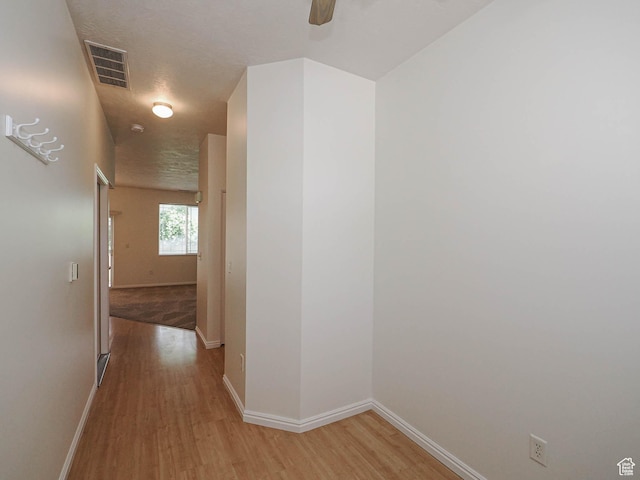 130 Bamberger Rd, North Salt Lake, UT 84054 - hall featuring light wood-style flooring and baseboards