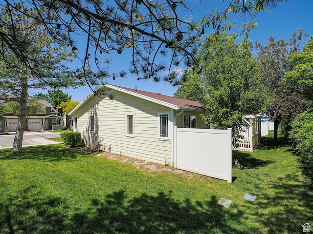 130 Bamberger Rd, North Salt Lake, UT 84054 - view of side of property featuring driveway