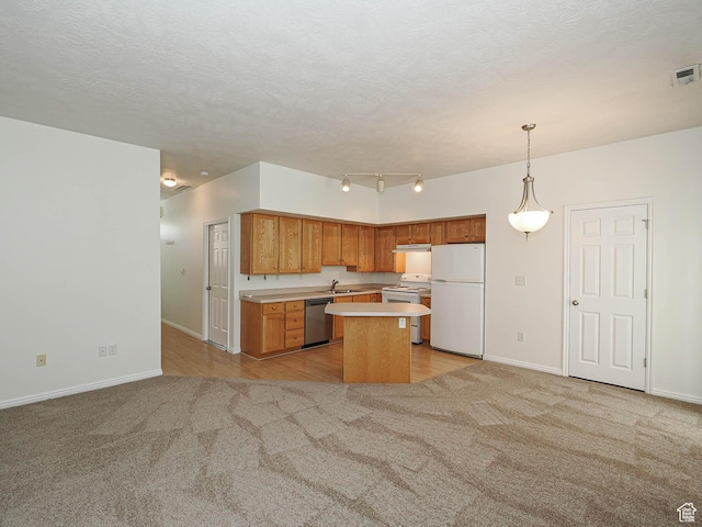 130 Bamberger Rd, North Salt Lake, UT 84054 - kitchen with white appliances, light carpet, a sink, light countertops, and baseboards