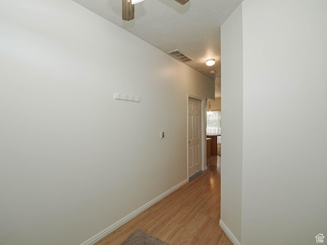 130 Bamberger Rd, North Salt Lake, UT 84054 - corridor featuring light wood-style floors and baseboards