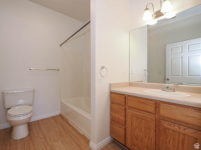 130 Bamberger Rd, North Salt Lake, UT 84054 - bathroom featuring toilet, wood finished floors, vanity, and baseboards