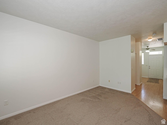 130 Bamberger Rd, North Salt Lake, UT 84054 - spare room featuring carpet flooring, a ceiling fan, and baseboards