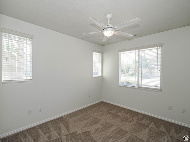 130 Bamberger Rd, North Salt Lake, UT 84054 - carpeted spare room featuring ceiling fan and baseboards
