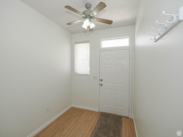 130 Bamberger Rd, North Salt Lake, UT 84054 - entryway with light wood-type flooring, baseboards, and a ceiling fan