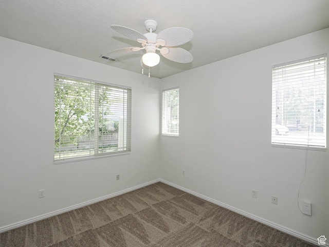 130 Bamberger Rd, North Salt Lake, UT 84054 - carpeted empty room featuring baseboards and a ceiling fan
