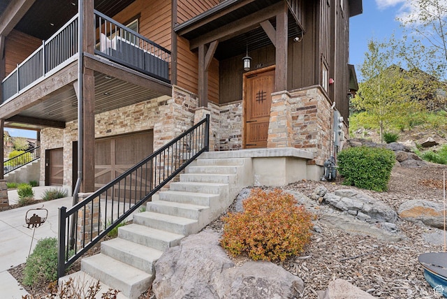 1757 E Longview Dr Unit 87, Hideout, UT 84036 - doorway to property featuring stone siding, board and batten siding, and a balcony