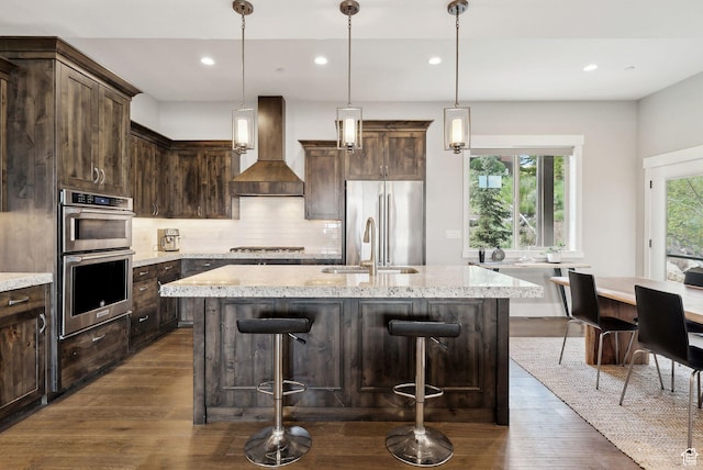 1757 E Longview Dr Unit 87, Hideout, UT 84036 - kitchen featuring custom range hood, appliances with stainless steel finishes, dark wood finished floors, decorative backsplash, and recessed lighting