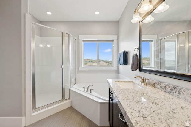 1757 E Longview Dr Unit 87, Hideout, UT 84036 - bathroom with healthy amount of natural light, a shower stall, vanity, and a bath