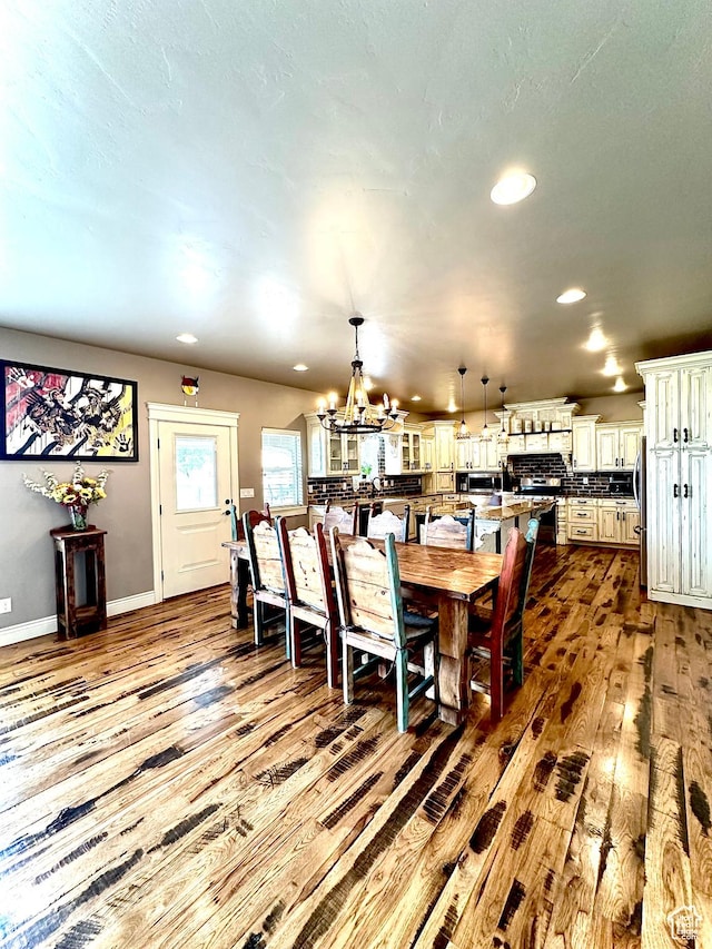 1471 N 3500 E, Ballard, UT 84066 - dining space featuring hardwood / wood-style floors, a chandelier, recessed lighting, and baseboards