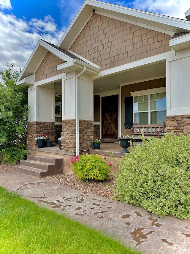 1471 N 3500 E, Ballard, UT 84066 - view of exterior entry with covered porch and stone siding