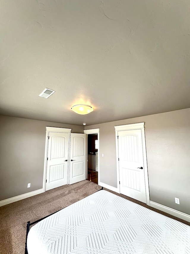 1471 N 3500 E, Ballard, UT 84066 - unfurnished bedroom featuring baseboards and carpet floors