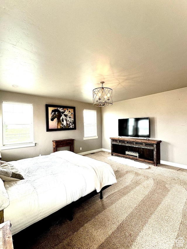 1471 N 3500 E, Ballard, UT 84066 - bedroom featuring baseboards, a chandelier, and carpet