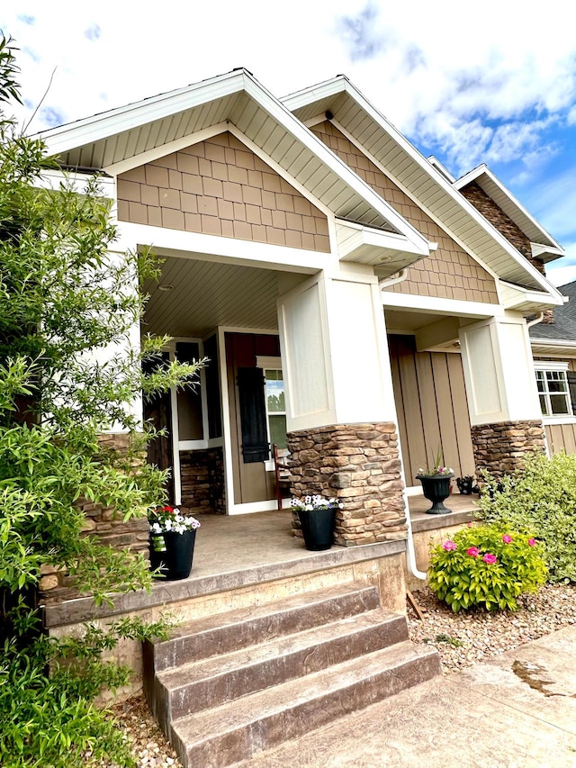 1471 N 3500 E, Ballard, UT 84066 - property entrance with stone siding and a porch
