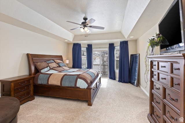 13695 Highlander Cir, Beaverdam, UT 84306 - bedroom with light carpet, a tray ceiling, baseboards, a ceiling fan, and recessed lighting