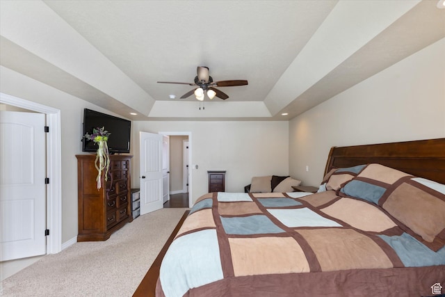 13695 Highlander Cir, Beaverdam, UT 84306 - carpeted bedroom with a tray ceiling, baseboards, recessed lighting, and ceiling fan